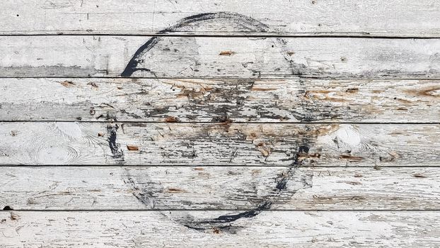 Grunge plank wood texture background. Close up of gray wooden fence panels.