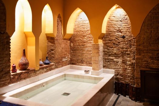 Arabic baths Hammam in Granada, Andalusia, Spain. Elvira baths. Cold water pool.