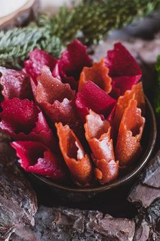 Fruit rolls pastille. Apple candy rolls, chips. Shredded and dried fruits. Useful sweetness. Food dessert. Homemade snack. Degidrated fruits. Natural and healthy, Sugar-Free, nutrition.