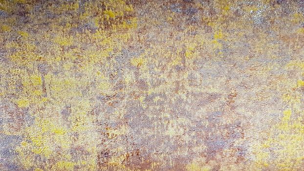 Brown, gray and gold dirty concrete wall plaster texture. Decorative paint for walls or grunge style background. Decorative plaster