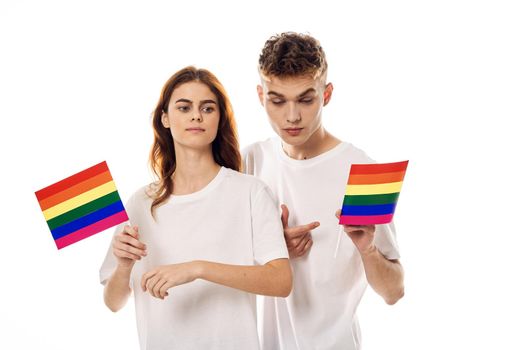 young couple in white t-shirts Flag lgbt transgender sexual minorities. High quality photo