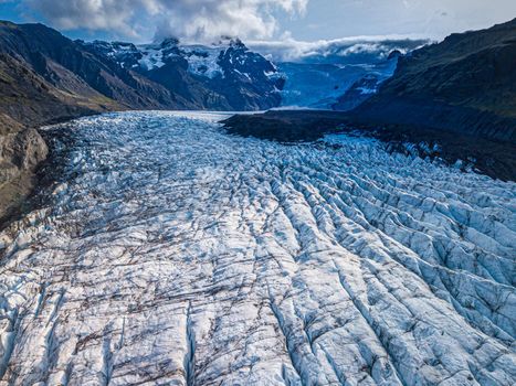 Svnafellsjkull Glacier in Iceland. Top view. Skaftafell National Park. Ice and ashes of the volcano texture landscape, beautiful nature ice background from Iceland
