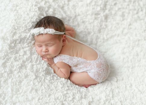 Cute sleeping newborn baby girl