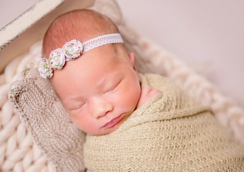 Cute sleeping newborn baby girl