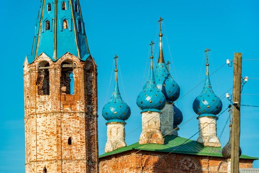Dunilovo - September 2020, Russia: View of the domes and tower of the Annunciation Church and Church of the Theotokos of Kazan