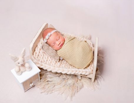 Cute sleeping newborn baby girl