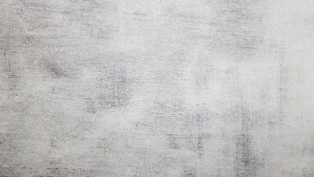 Natural gray slate stone background pattern. View from above. Copy space. Tile with a gray tint. Texture and seamless background.