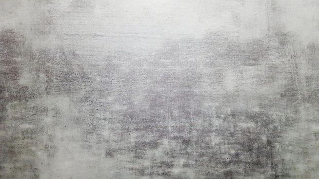 Natural gray slate stone background pattern. View from above. Copy space. Tile with a gray tint. Texture and seamless background.