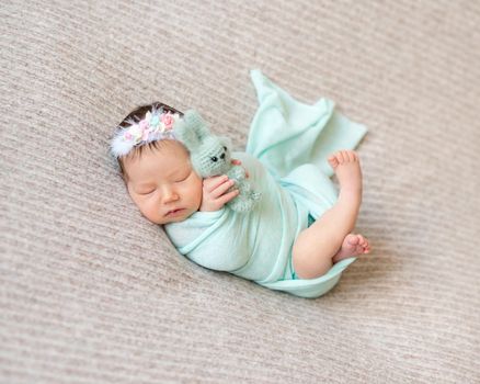 Cute sleeping newborn baby girl