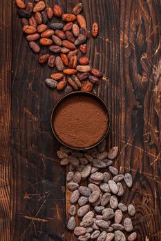 Raw cocoa beans two types Venezuela on brown background.