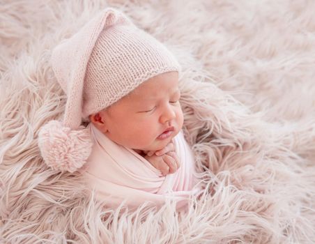 newborn baby girl sleeping sweetly