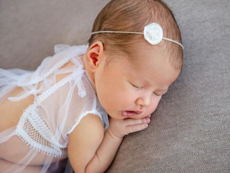 newborn baby girl sleeping sweetly