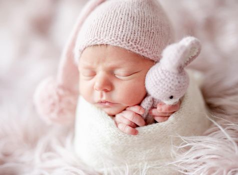 cute sleepy newborn baby girl