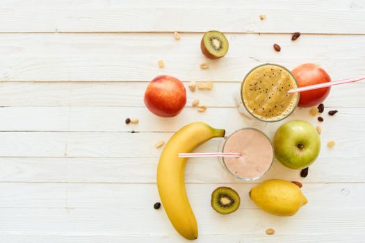 fresh fruit cocktail breakfast dessert organic wood background. High quality photo