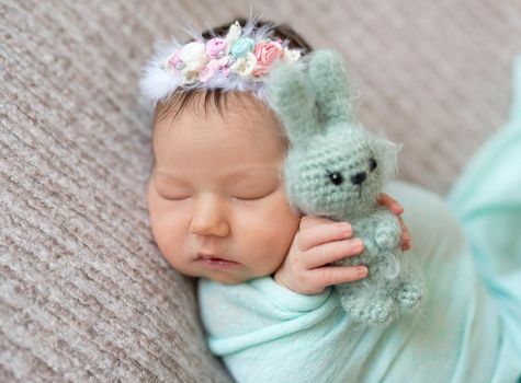 Cute sleeping newborn baby girl