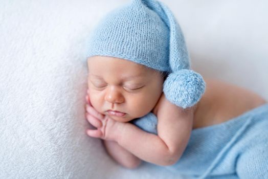 Cute sleeping newborn baby boy