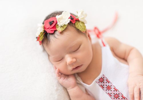 Cute sleeping newborn baby girl