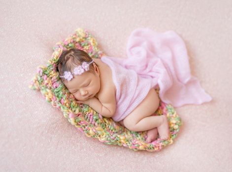 Cute sleeping newborn baby girl