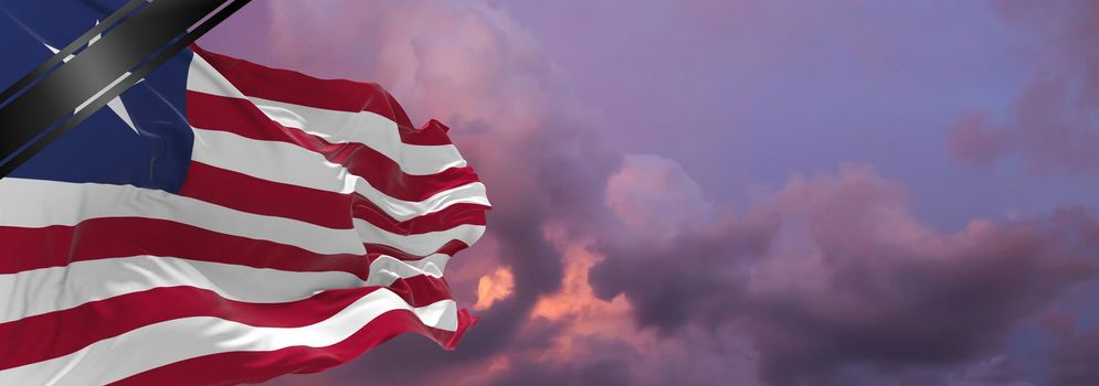 national flag of Liberia with Mourning Ribbon. memory of victims of war, terrorist attack, coronavirus. Black funeral ribbon on flag Honoring memory of victims. 3D illustration.