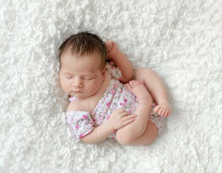 Cute sleeping newborn baby girl