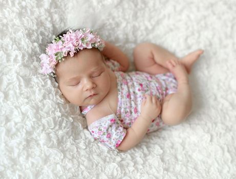 Cute sleeping newborn baby girl