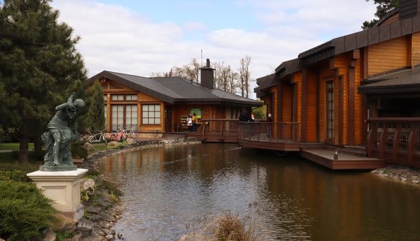 Luxurious residence of the former President of Ukraine Viktor Yanukovych on the shore of the pond. Luxurious house Honka in Mezhyhirya. Ukraine, Novye Petrovtsi - June 05, 2021