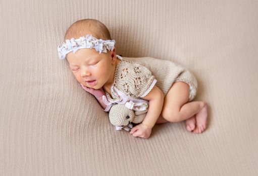 Cute sleeping newborn baby girl