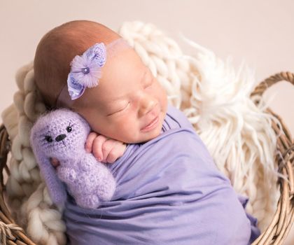 Cute sleeping newborn baby girl