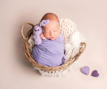 Cute sleeping newborn baby girl