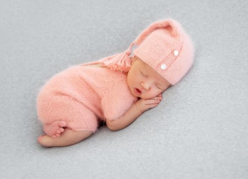 newborn baby girl sleeping sweetly
