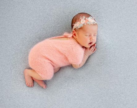 newborn baby girl sleeping sweetly