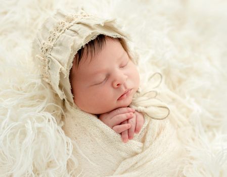 newborn baby girl sleeping sweetly