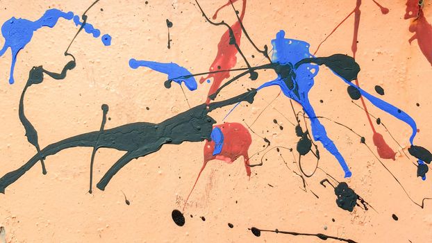 Layer paint with streaks of stains on iron. Yellow background. Ocher embossed texture. Fluid paint base. Inundations, trickles of amber paint, spots of various shapes on metal surface. Rust, corrosion.