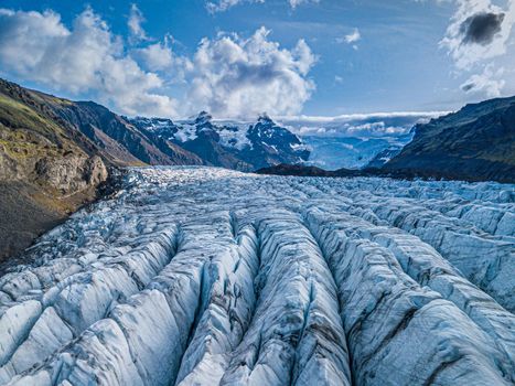 Svnafellsjkull Glacier in Iceland. Top view. Skaftafell National Park. Ice and ashes of the volcano texture landscape, beautiful nature ice background from Iceland