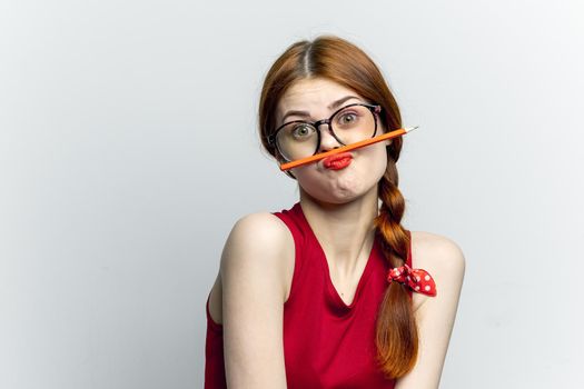 cheerful woman with glasses red dress notepad work. High quality photo