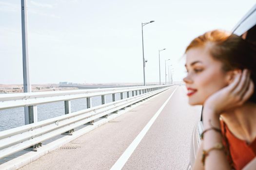 cheerful woman car ride road travel adventure. High quality photo