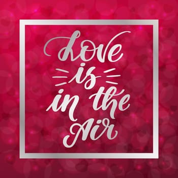 Love is in the air. Handwritten lettering on blurred bokeh background with hearts. illustration for posters, cards and much more.