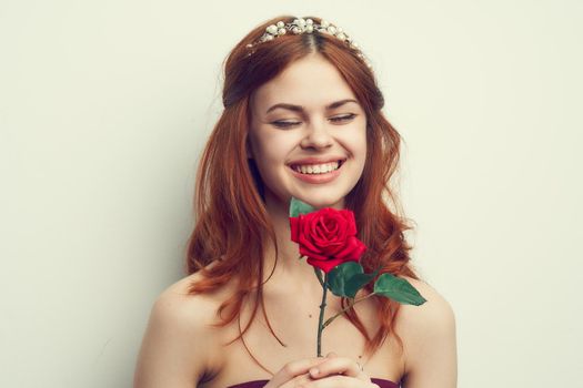 attractive woman with rose flower makeup romance model. High quality photo