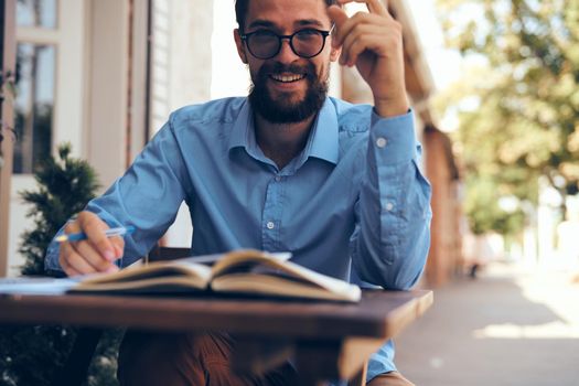 manager in a cafe work paper documents. High quality photo