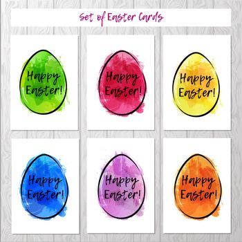 Set of Easter cards with colorful eggs on gray background. Imitation of watercolor. Template for greeting Easter cards.