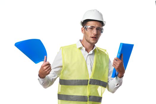 engineer in working uniform protective clothing documents construction. High quality photo