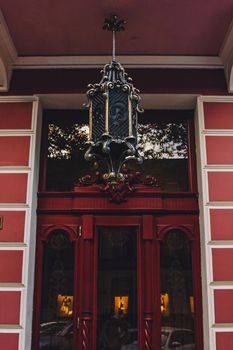 Old wooden weathered door in ancient town architecture