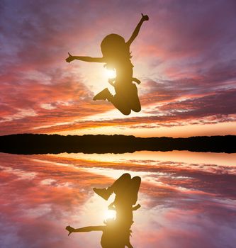 Cute little girl jump. Studio shot. White background