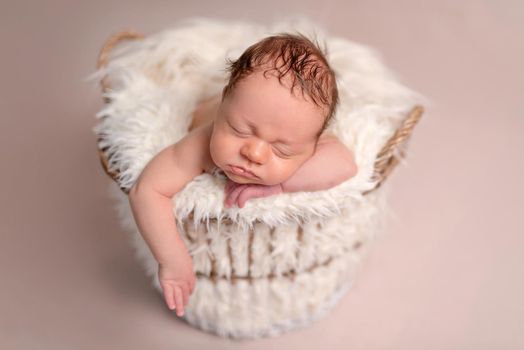 Cute sleeping newborn baby boy