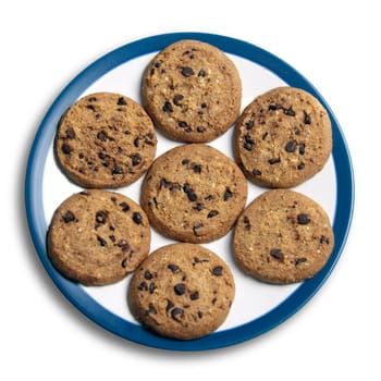 Seven chocolate chip cookies on a white and blue plate