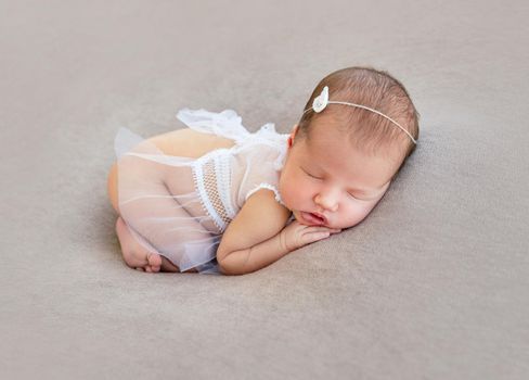 newborn baby girl sleeping sweetly