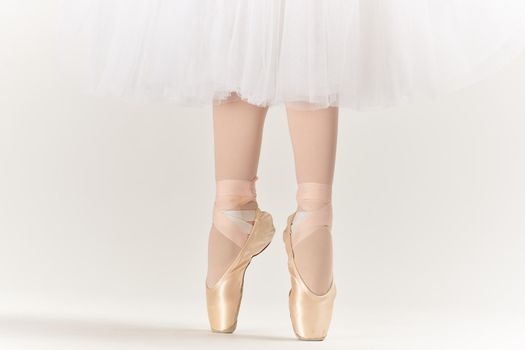 ballerina woman dance performed classical style light background. High quality photo