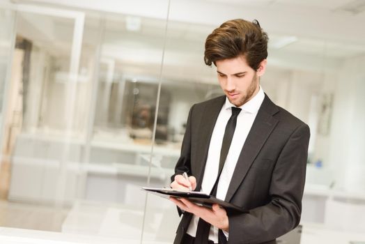 Portrait of businessman in modern office