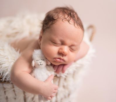 Cute sleeping newborn baby boy