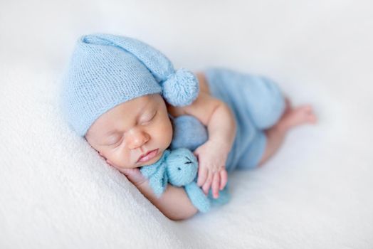 Cute sleeping newborn baby boy